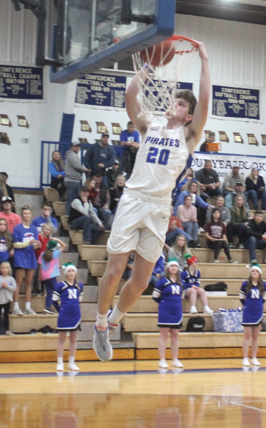 Norwood’s Garrett Davault puts in a dunk in the second half against Bakersfield.